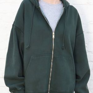 Oversized zip-up hoodie from Brandy Melville. Dark green color.